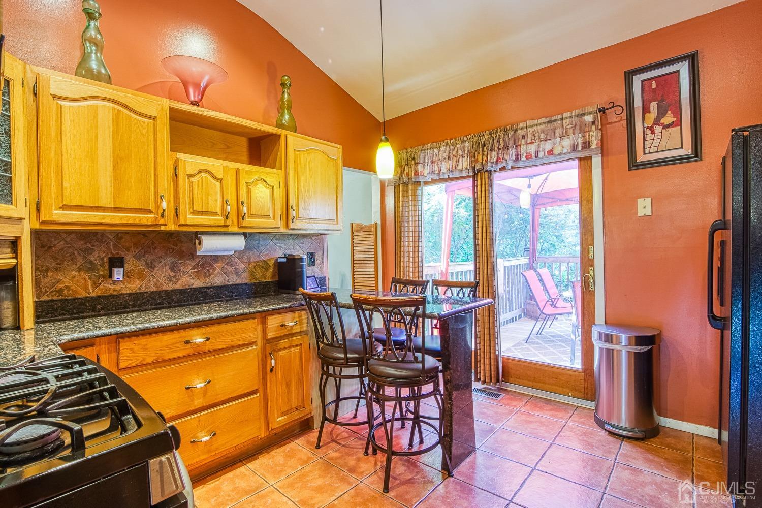 30 Kingsbridge Road Somerset, NJ 08873 - Photo 9 of 23 a kitchen that has a cabinets stove and refrigerator