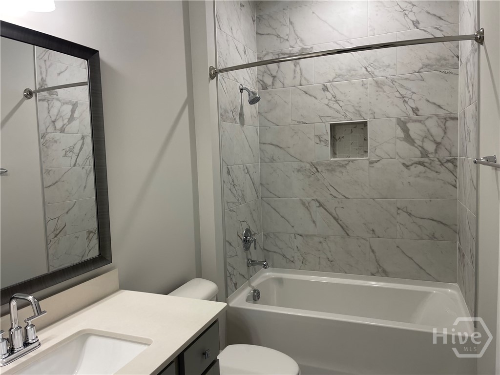 176 Champlain Drive Pooler, GA 31322 - Photo 7 of 22 Secondary Bath with Tile Walls