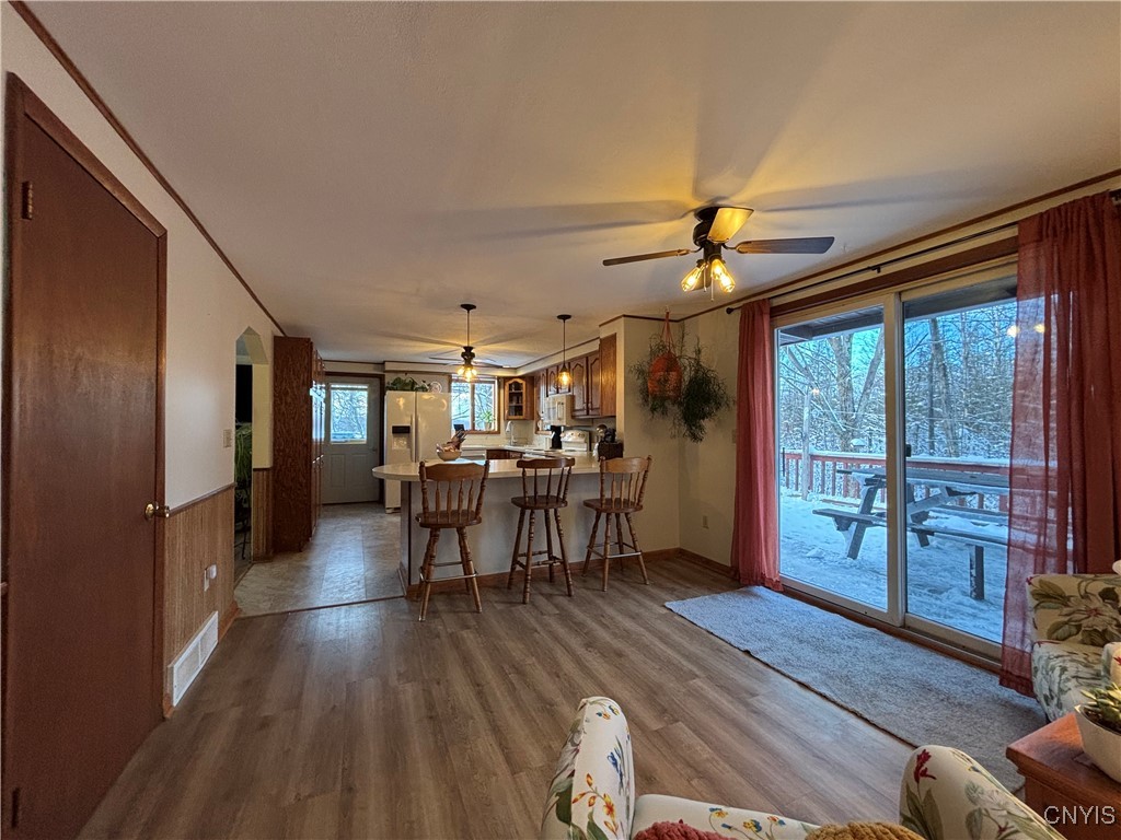 452 County Rte 28 Pulaski, NY 13142 - Photo 23 of 50 Dining area and sliders out to private wraparound