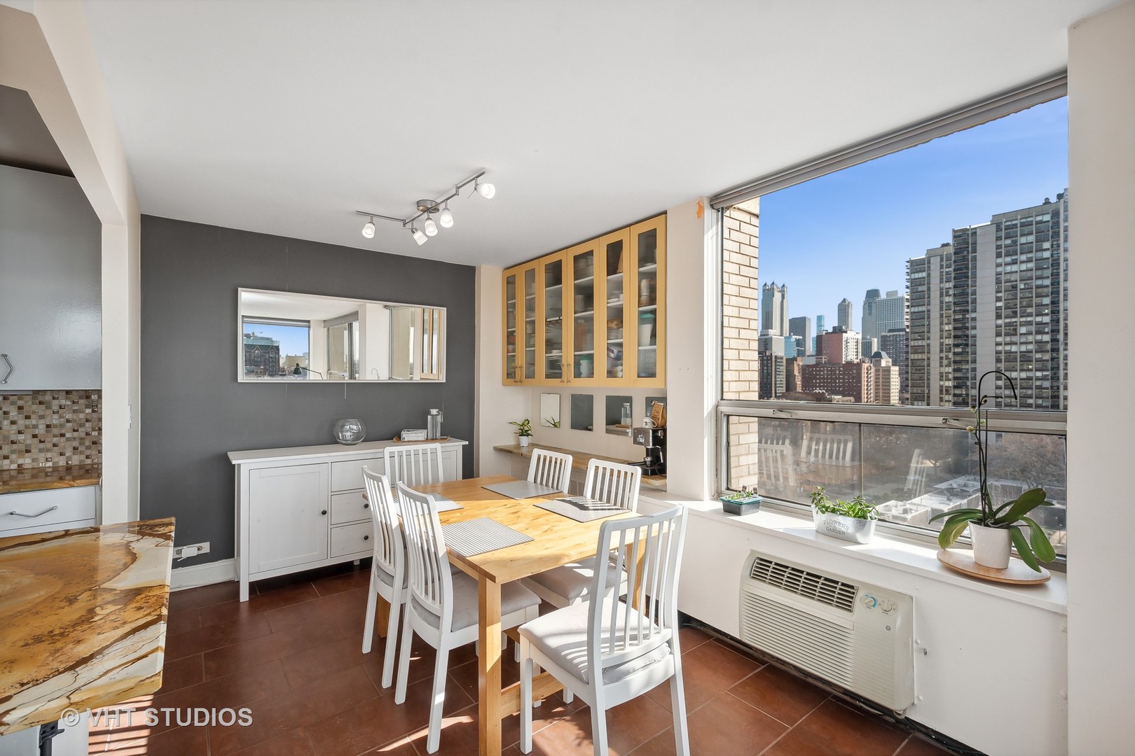 Undisclosed Address Chicago, IL 60610 - Photo 6 of 16 a kitchen with a stove a sink and a refrigerator