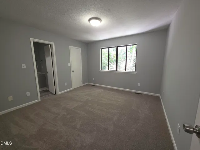 a bathroom with a sink vanity and mirror