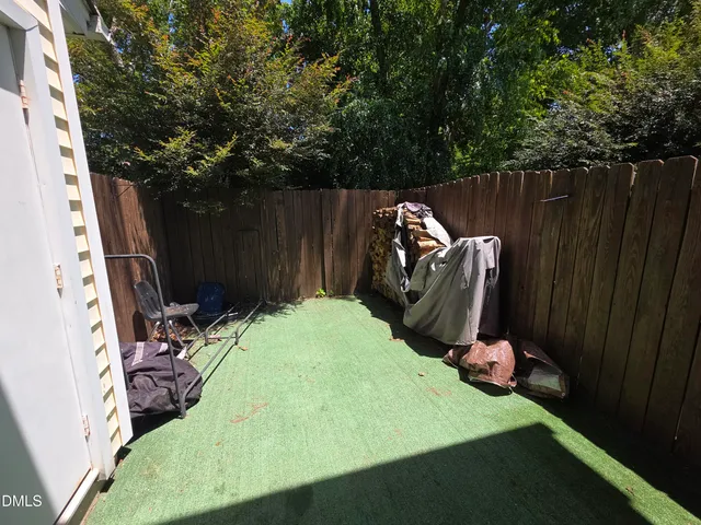 a view of backyard with tree