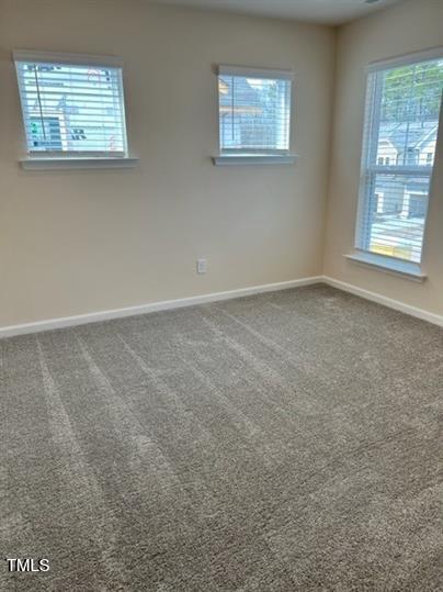 315 Villanova Drive Durham, NC 27713 - Photo 14 of 19 an empty room with windows