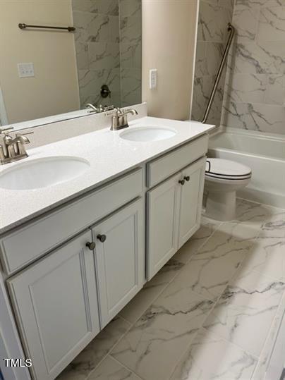 315 Villanova Drive Durham, NC 27713 - Photo 15 of 19 a bathroom with a sink and a mirror
