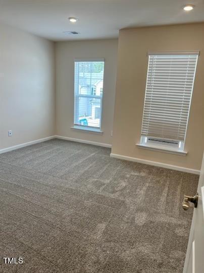 315 Villanova Drive Durham, NC 27713 - Photo 18 of 19 an empty room with windows