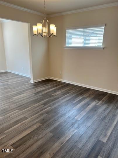 315 Villanova Drive Durham, NC 27713 - Photo 7 of 19 a view of a livingroom with wooden floor and a large window