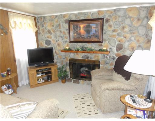 1167 Millwood Road Derry, PA 15627 - Photo 8 of 9 Family Room. With Stone Fireplace