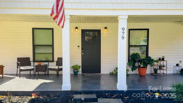 a kitchen with a table and chairs