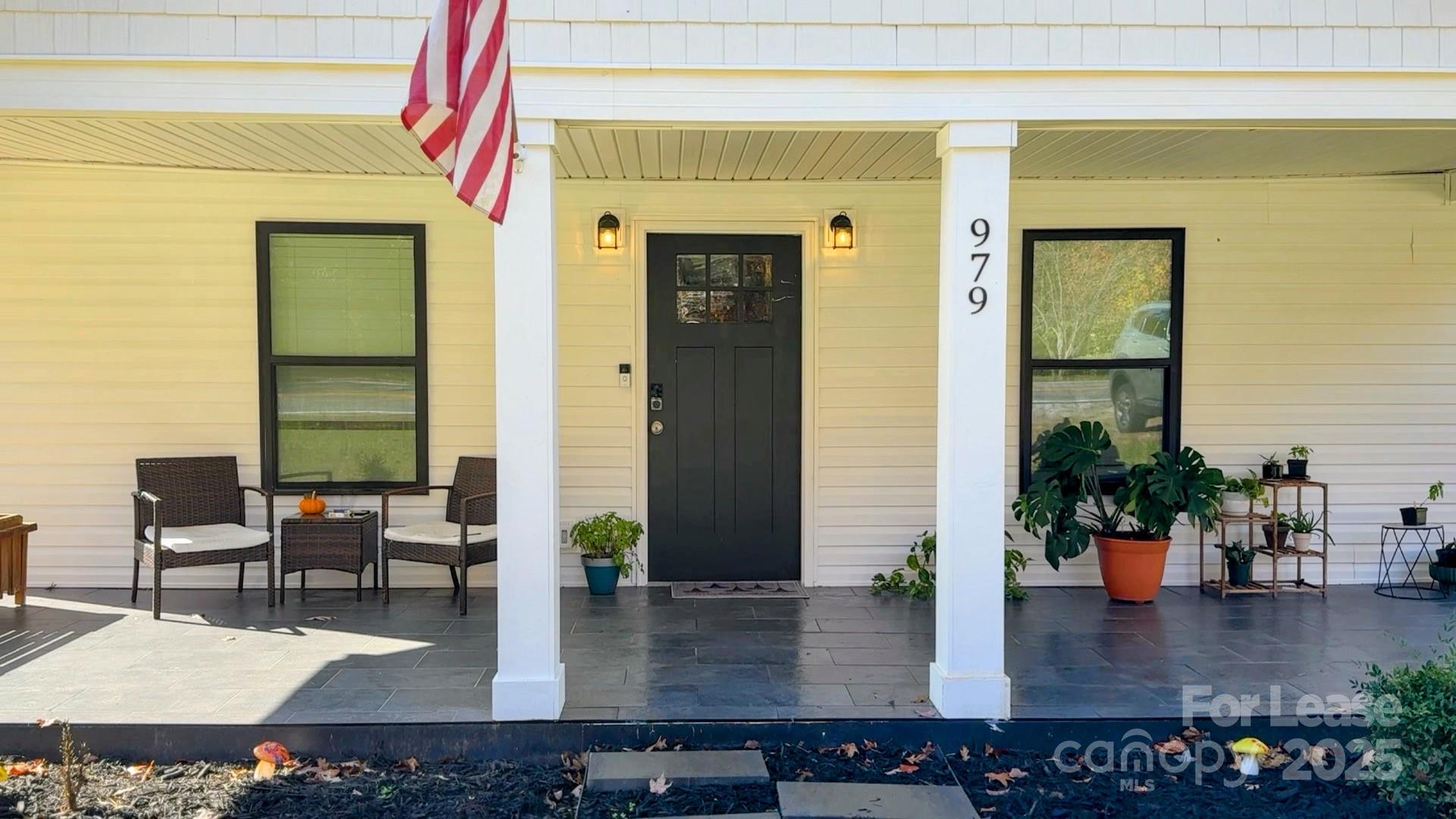 979 Howard Gap Road Tryon, NC 28782 - Photo 1 of 11 a kitchen with a table and chairs