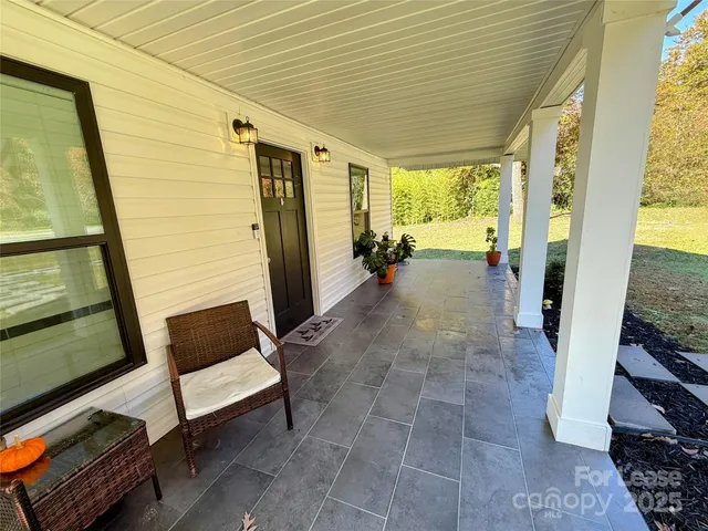 a view of a porch with chairs