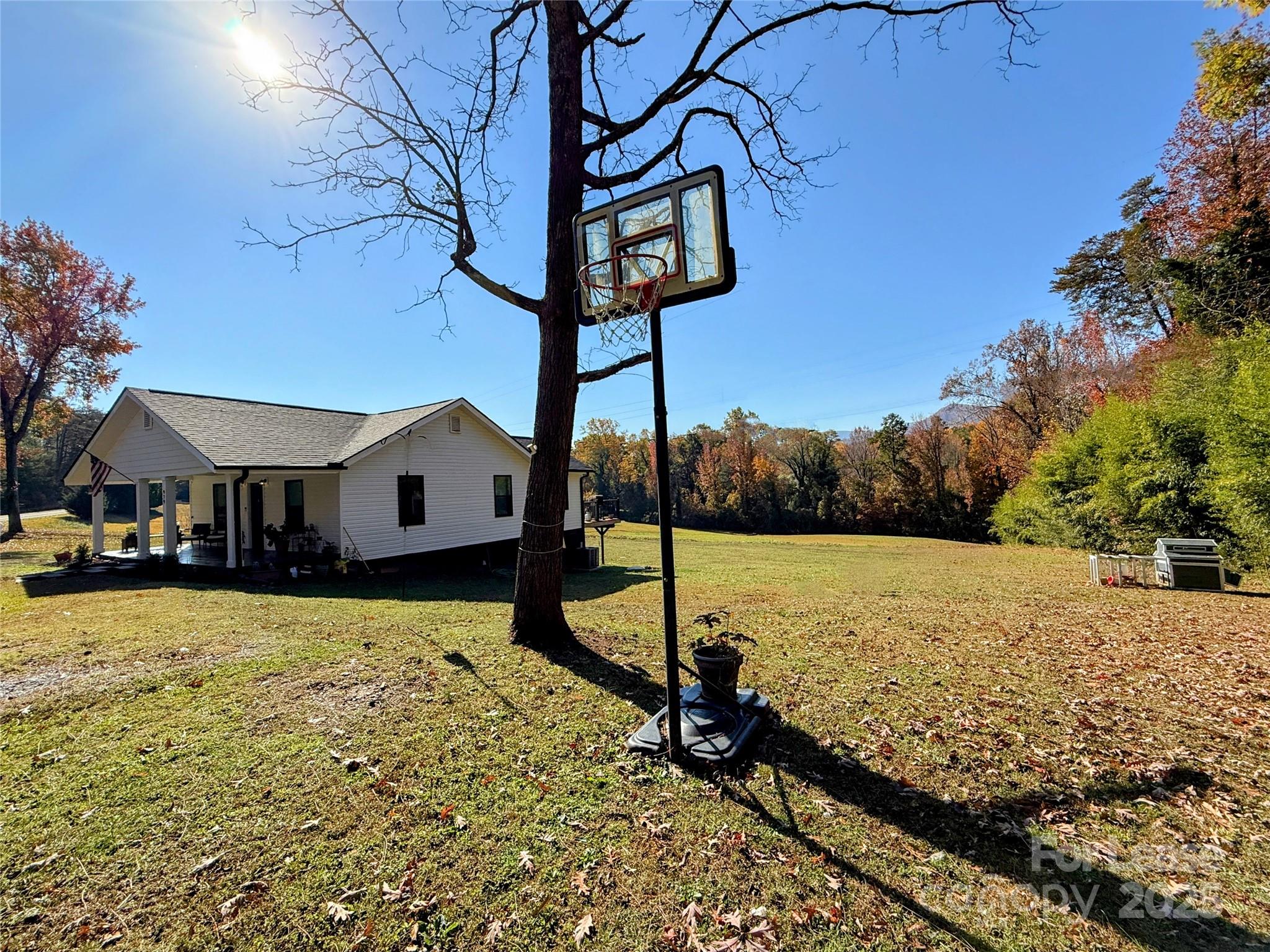 979 Howard Gap Road Tryon, NC 28782 - Photo 8 of 11 a view of a street with a yard