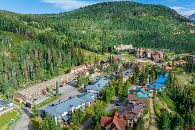 a view of a lake with a house