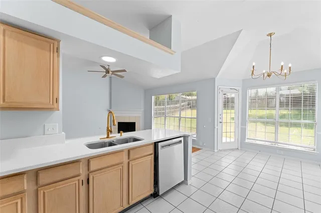 a bathroom with a sink toilet vanity and shower