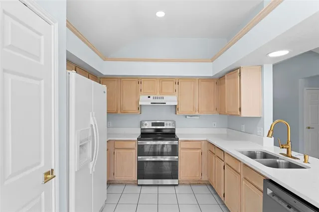 a view of a kitchen with furniture and window