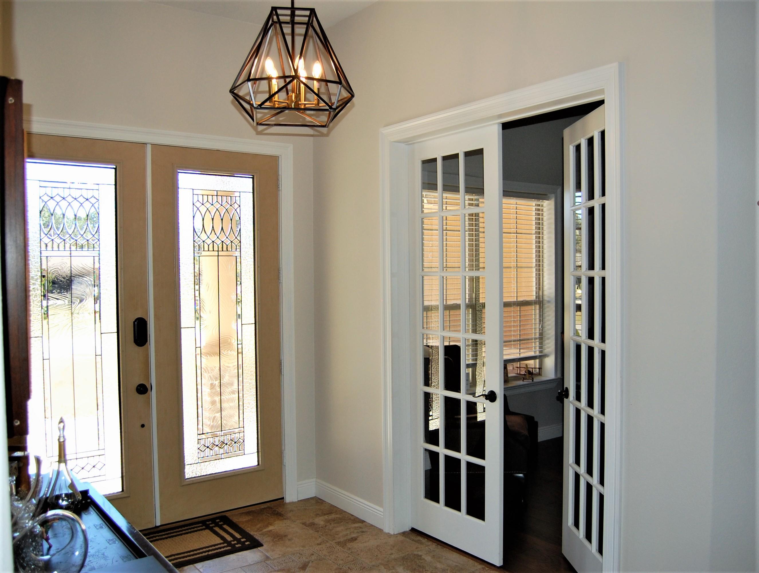 2497 Crescent Road Navarre, FL 32566 - Photo 13 of 51 a view of a livingroom with furniture window and hardwood floor