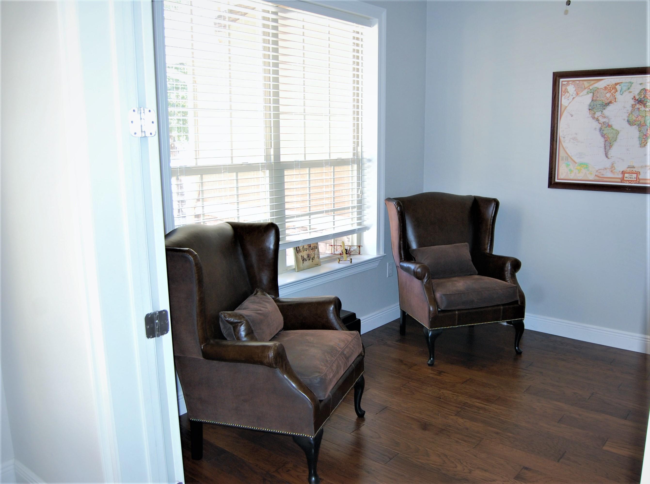2497 Crescent Road Navarre, FL 32566 - Photo 14 of 51 a living room with furniture and a window