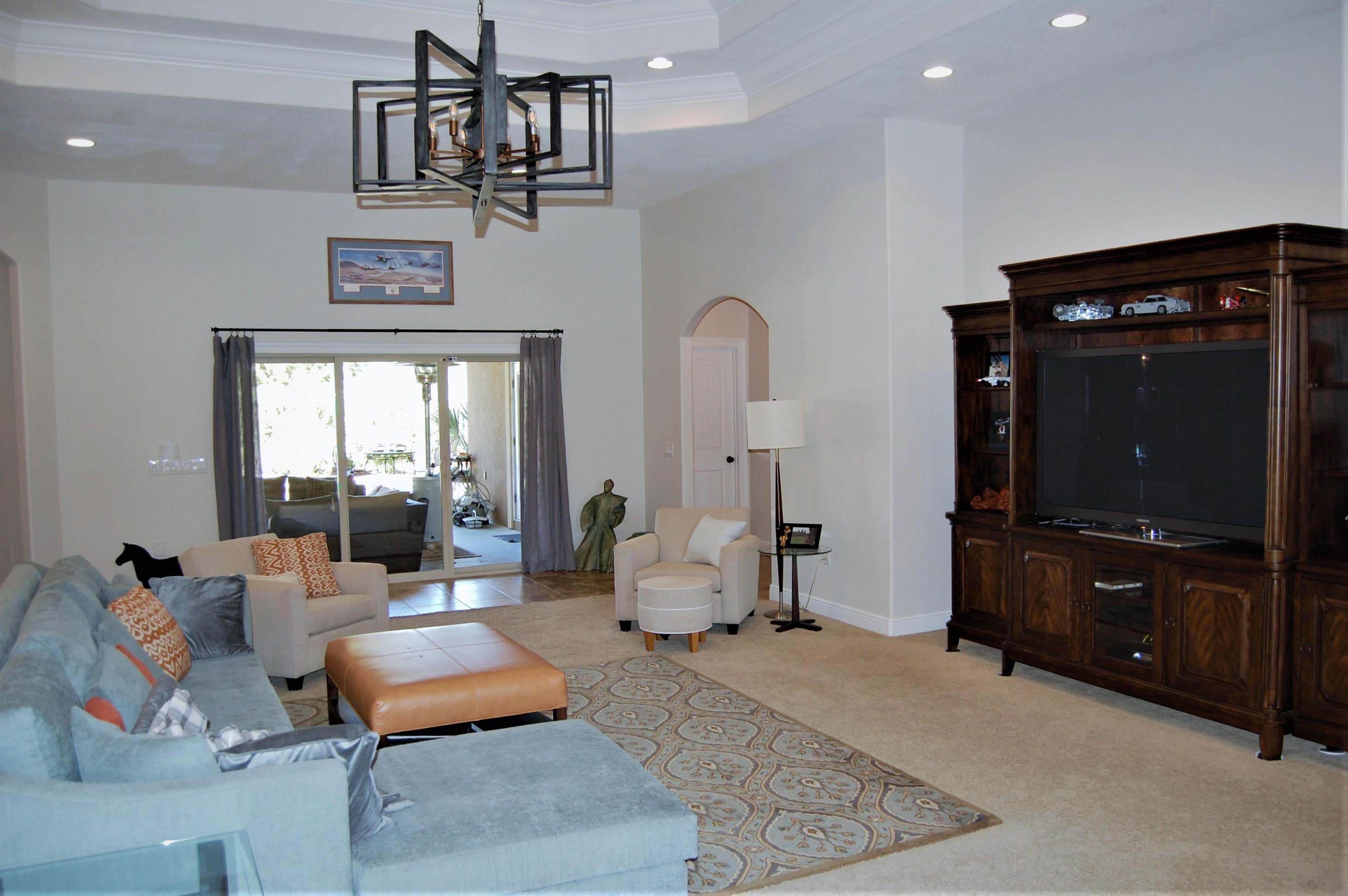 2497 Crescent Road Navarre, FL 32566 - Photo 18 of 51 a living room with furniture and wooden floor