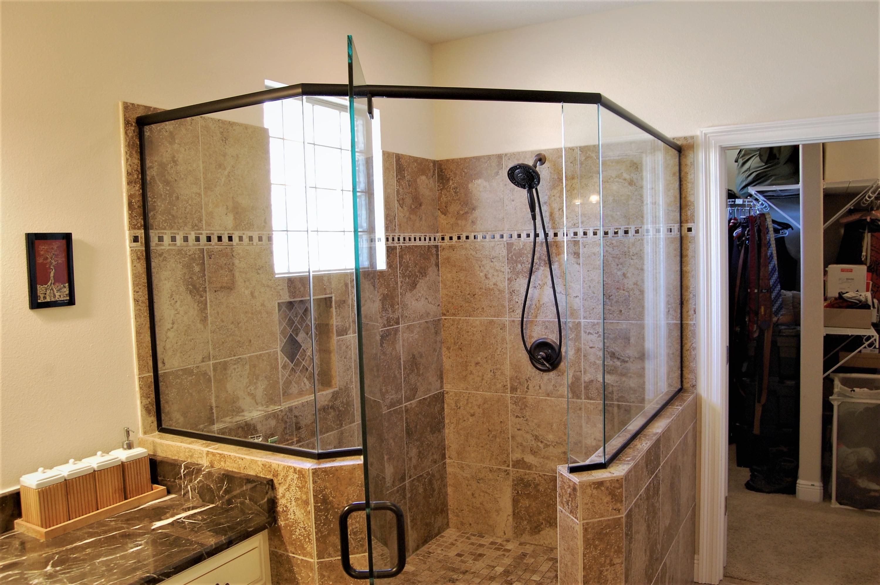 2497 Crescent Road Navarre, FL 32566 - Photo 26 of 51 a bathroom with a shower and a mirror