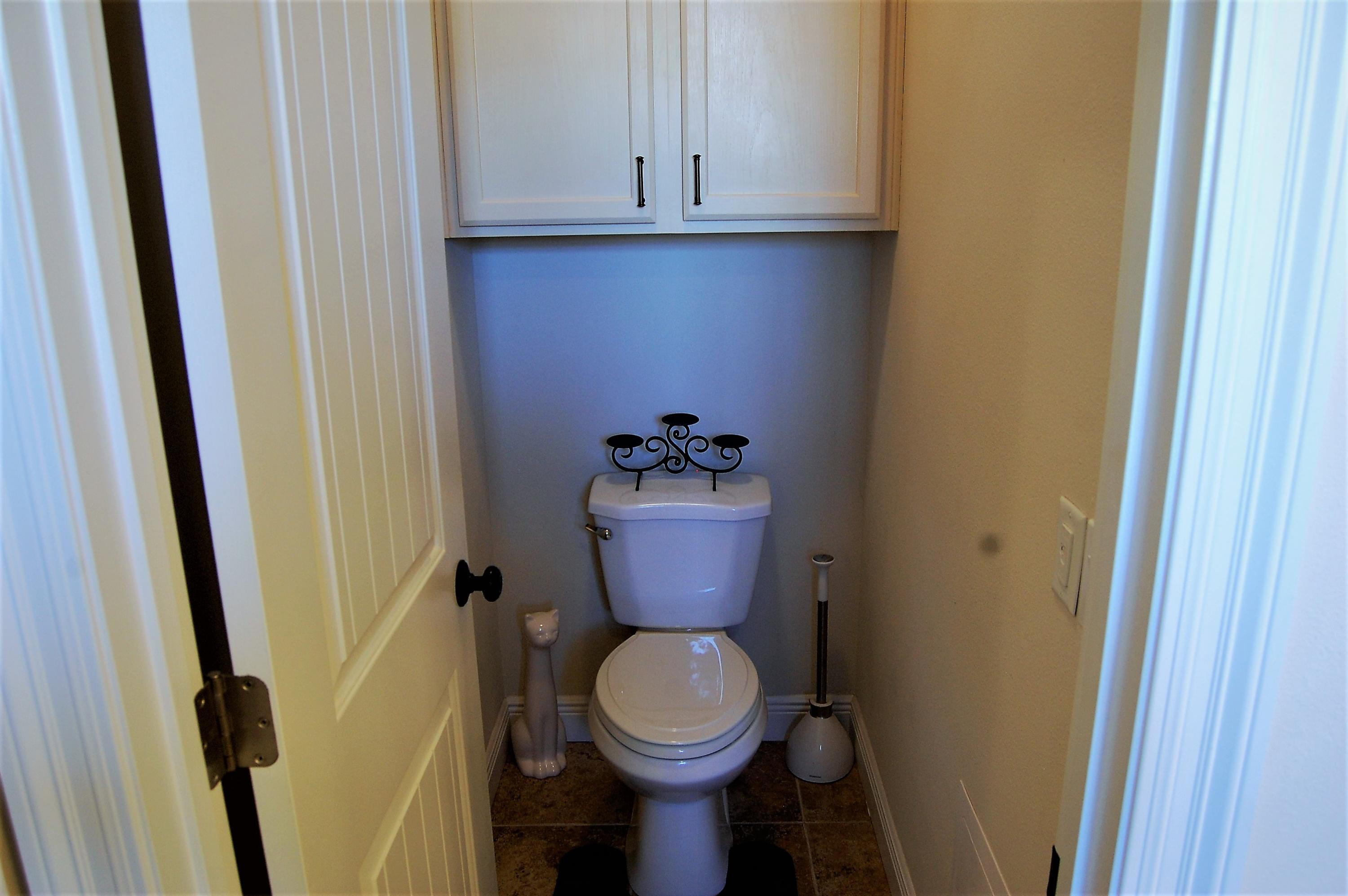 2497 Crescent Road Navarre, FL 32566 - Photo 29 of 51 a bathroom with a toilet and a sink