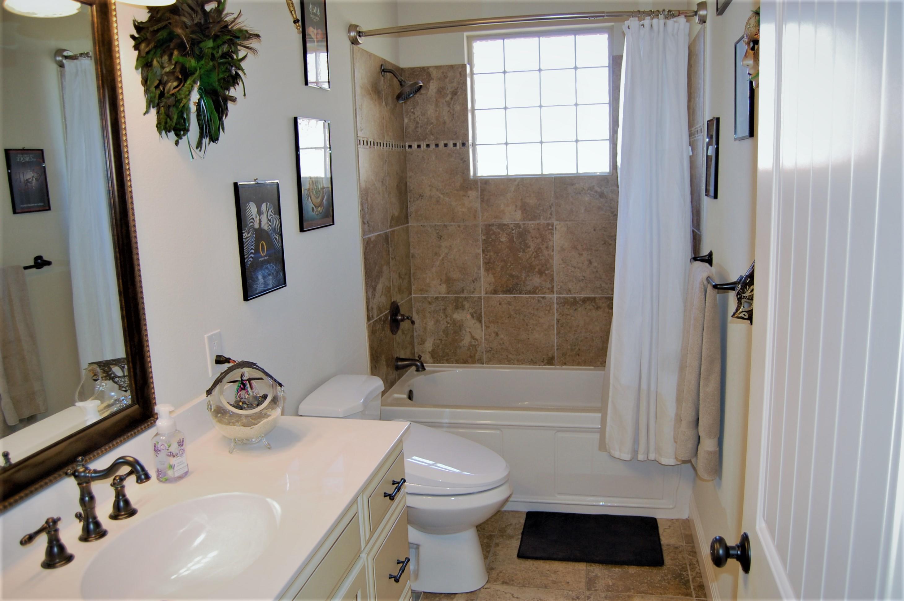 2497 Crescent Road Navarre, FL 32566 - Photo 35 of 51 a bathroom with a sink toilet and shower