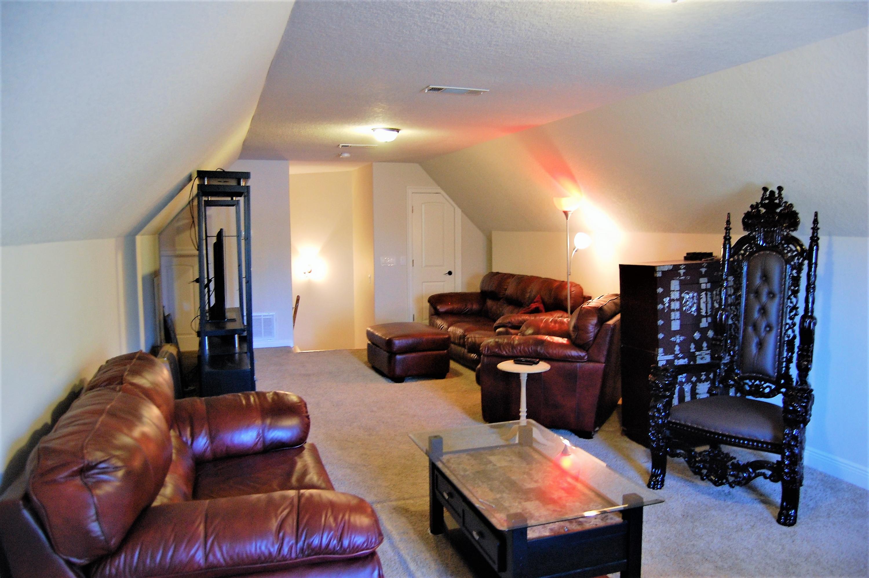 2497 Crescent Road Navarre, FL 32566 - Photo 38 of 51 a living room with furniture and wooden floor