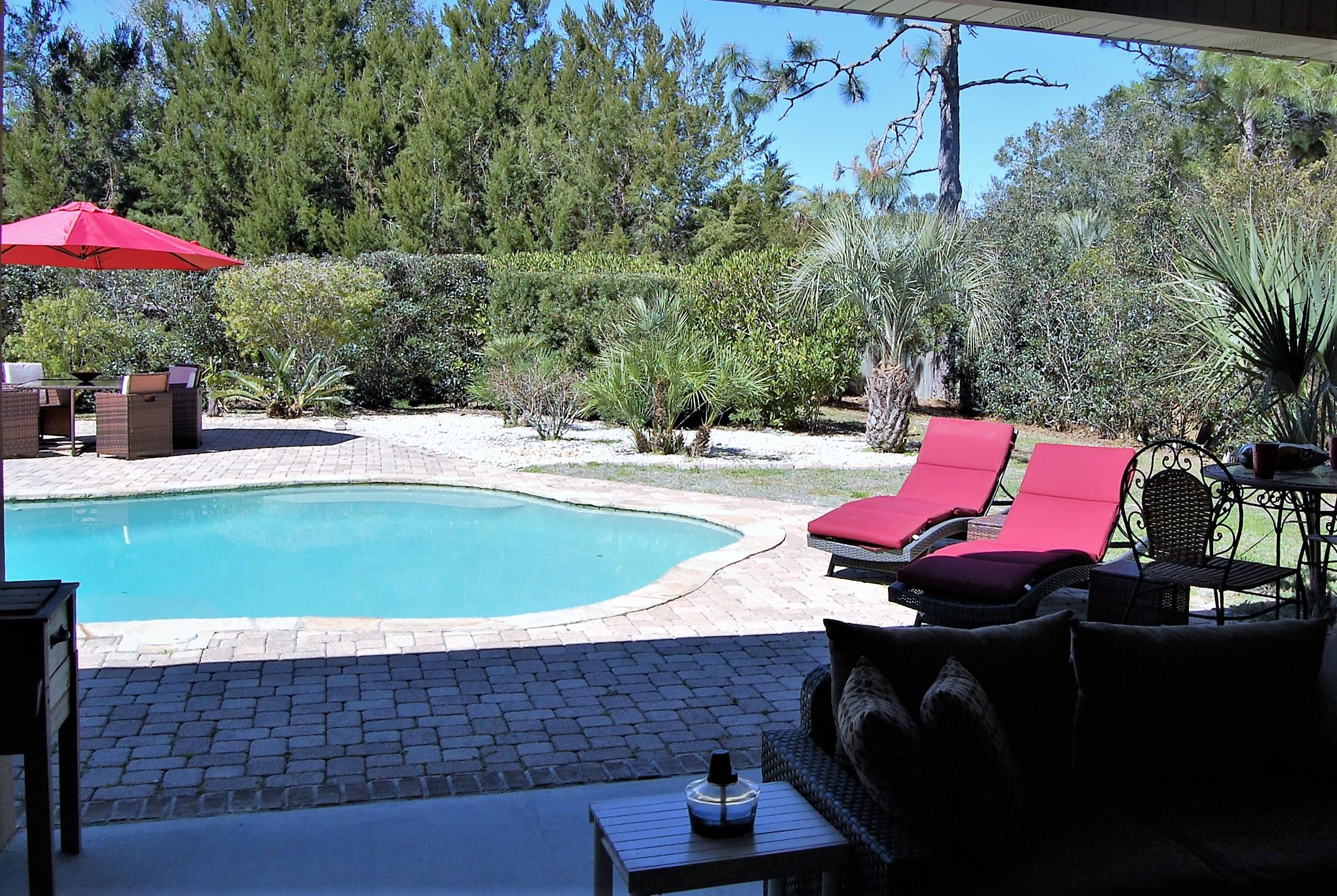 2497 Crescent Road Navarre, FL 32566 - Photo 41 of 51 swimming pool view with a seating space