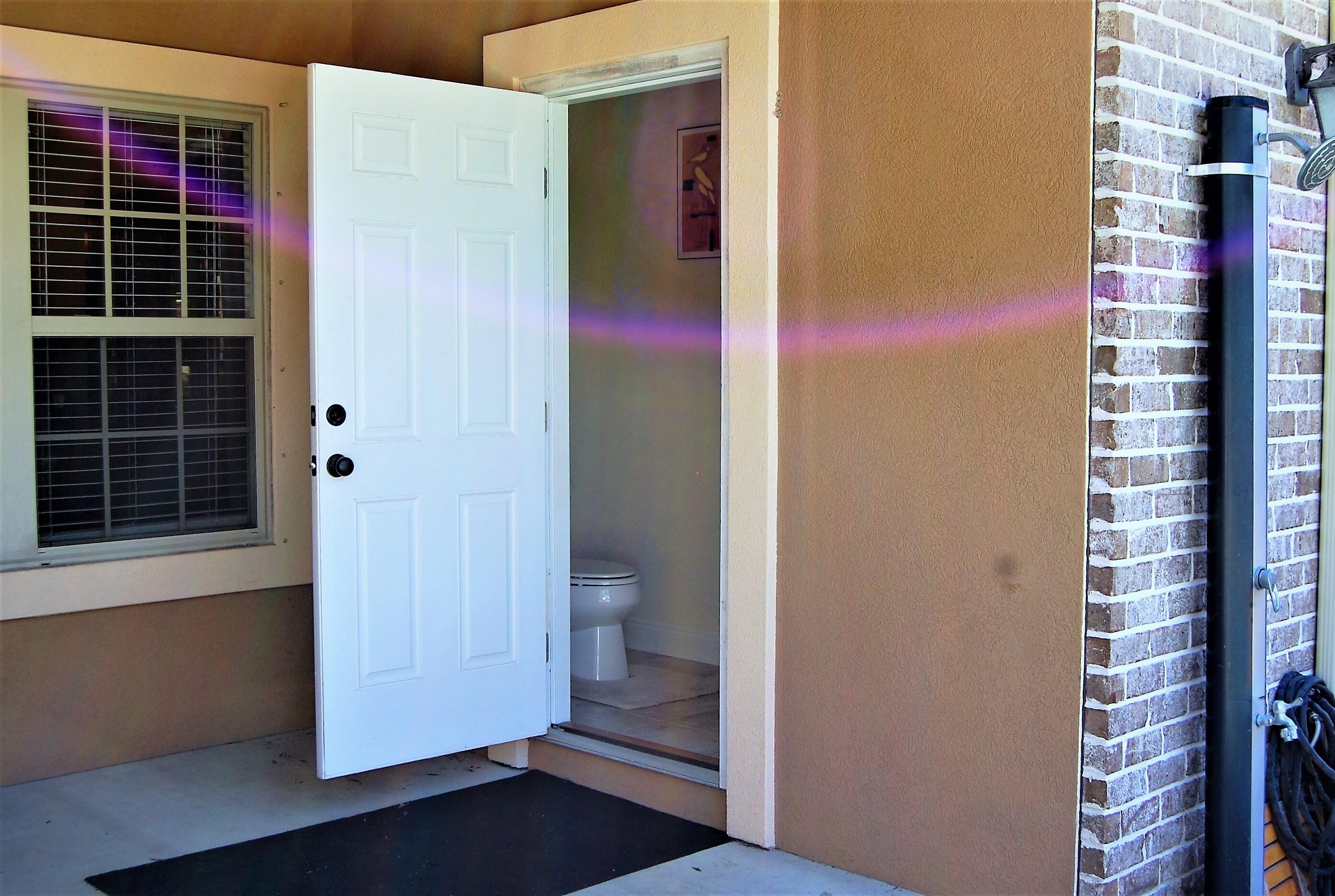 2497 Crescent Road Navarre, FL 32566 - Photo 43 of 51 a view of front door and porch