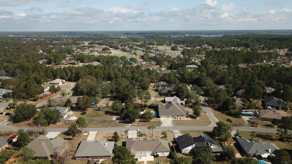 2497 Crescent Road Navarre, FL 32566 - Photo 51 of 51 an aerial view of multiple house