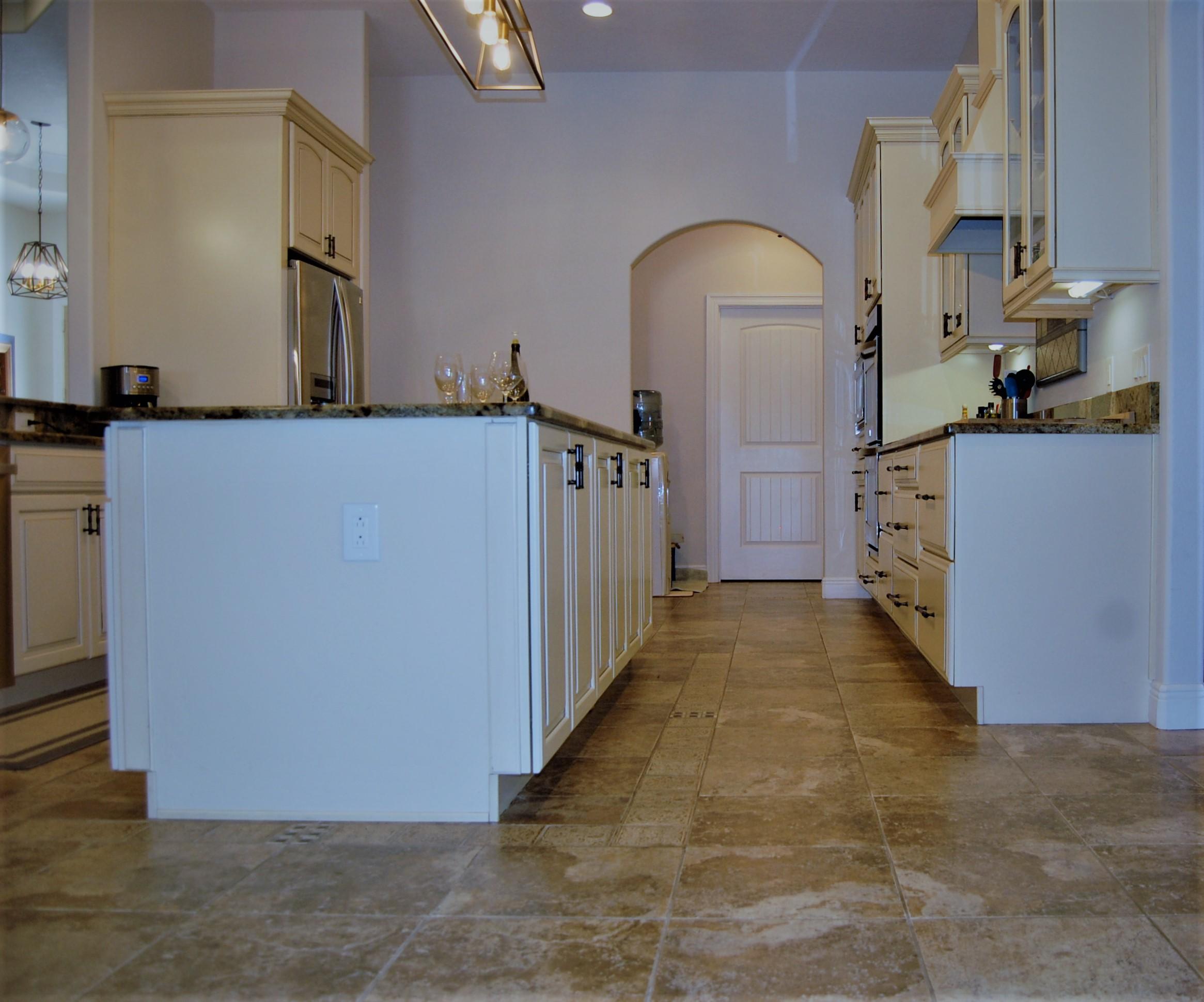 2497 Crescent Road Navarre, FL 32566 - Photo 10 of 51 a view of a hallway with entryway to kitchen