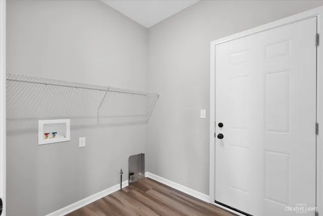 a view of small space with wooden floor