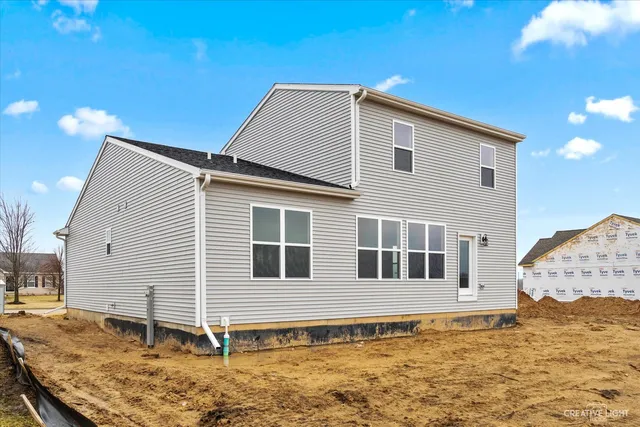 a house view with a backyard space