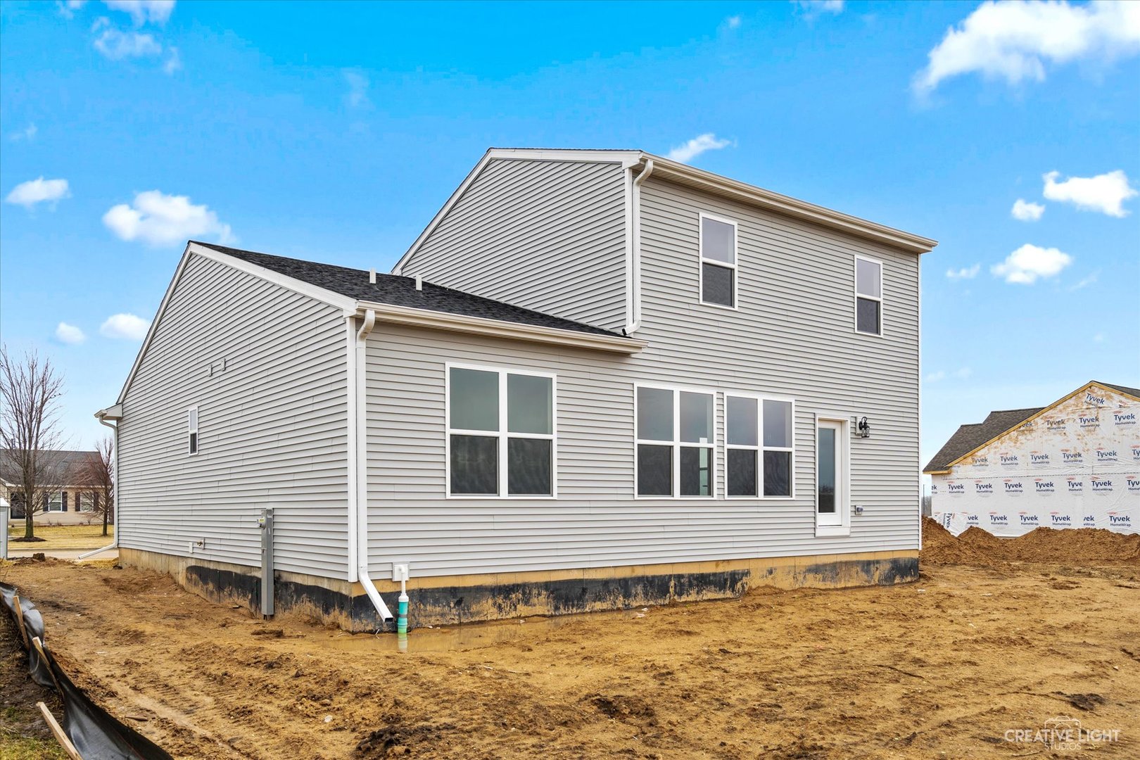 360 North Charles Street Cortland, IL 60112 - Photo 32 of 33 a house view with a backyard space