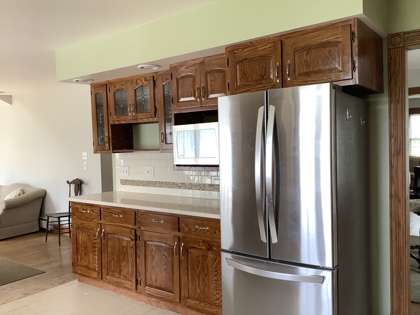 16623 West Sweedler Road Manhattan, IL 60442 - Photo 14 of 43 a kitchen with stainless steel appliances granite countertop a refrigerator and a stove top oven
