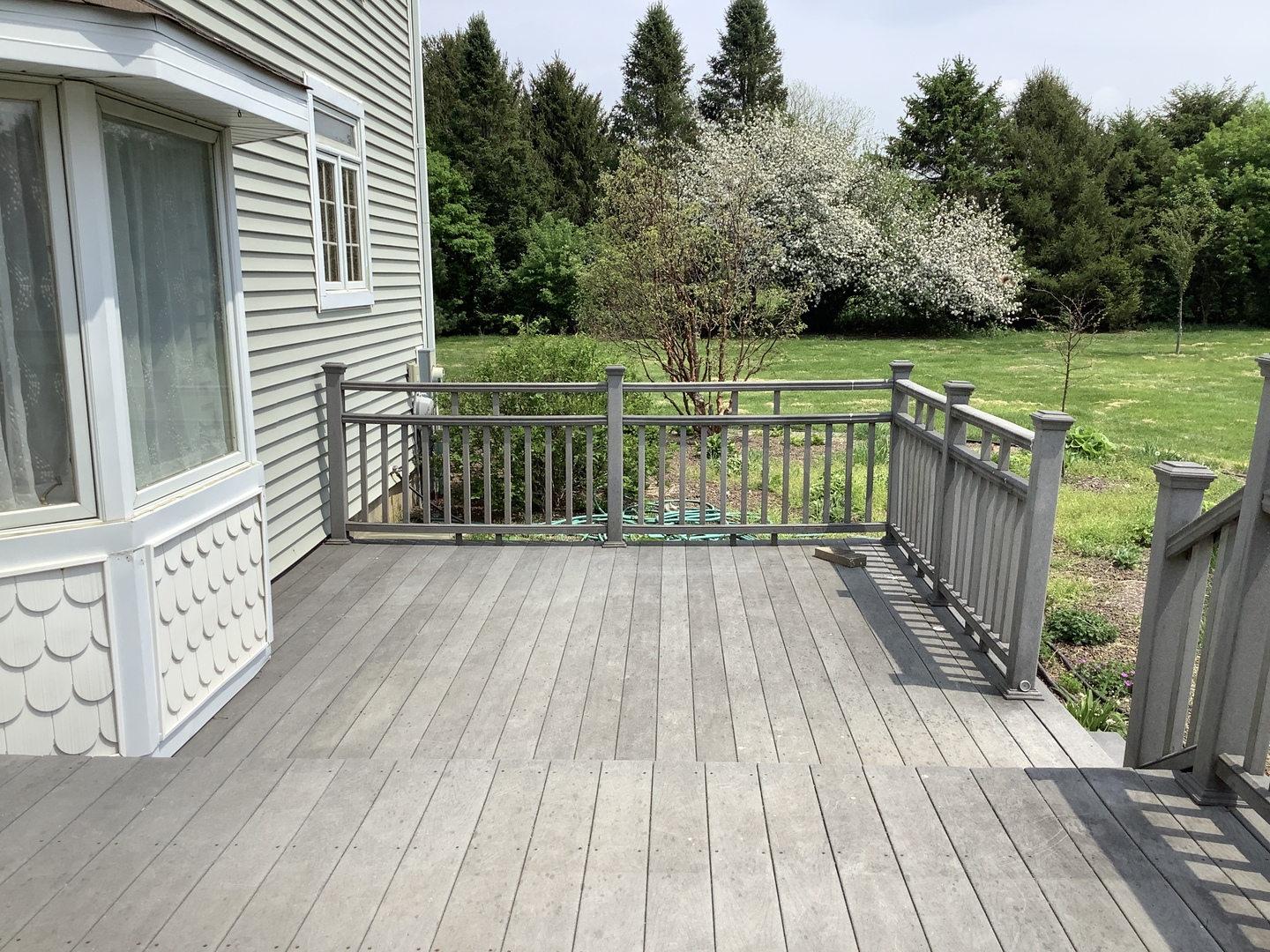 16623 West Sweedler Road Manhattan, IL 60442 - Photo 35 of 43 a view of deck with wooden floor and fence next to a yard
