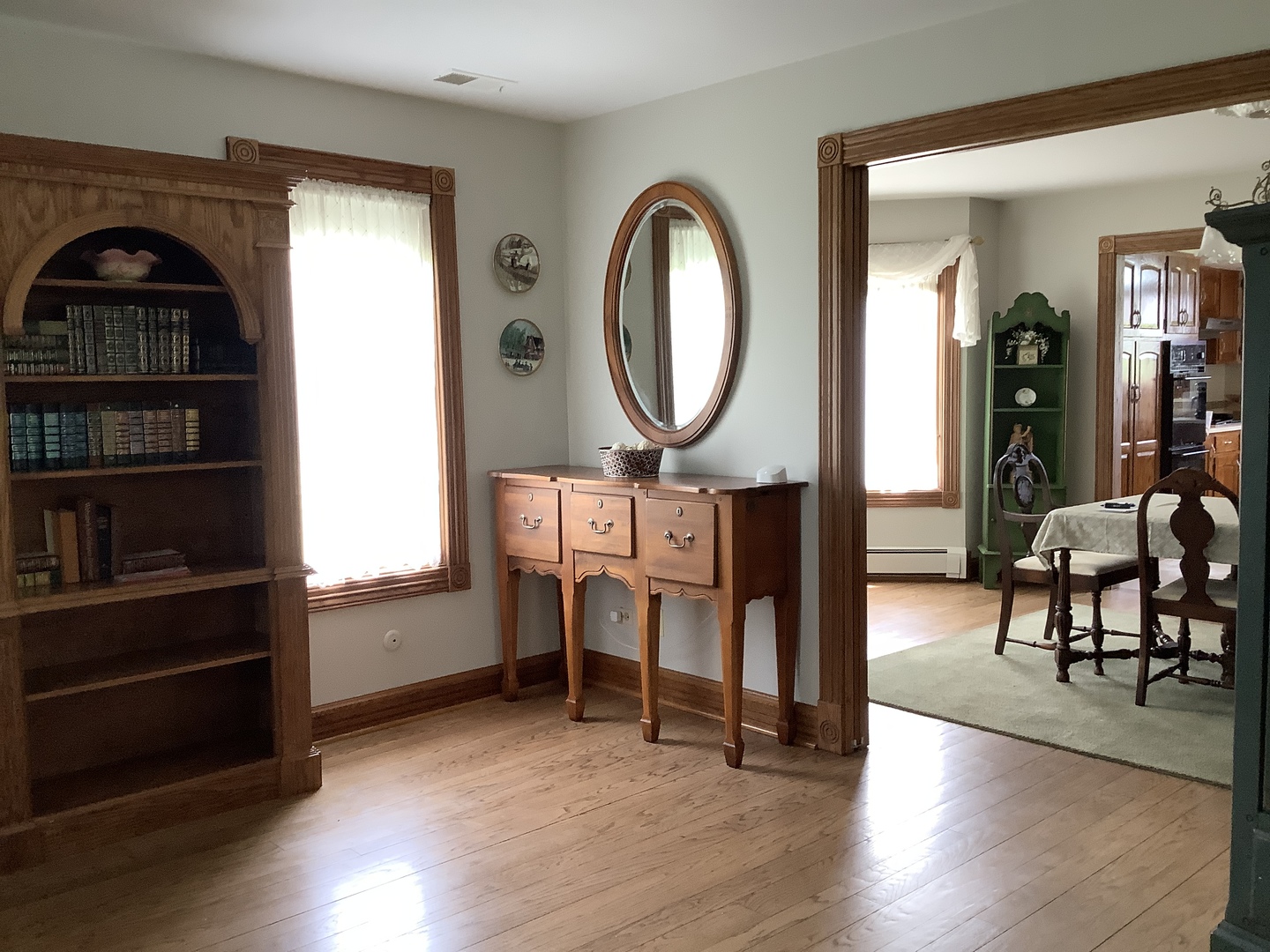 16623 West Sweedler Road Manhattan, IL 60442 - Photo 8 of 43 a view of a livingroom with furniture wooden floor and a window