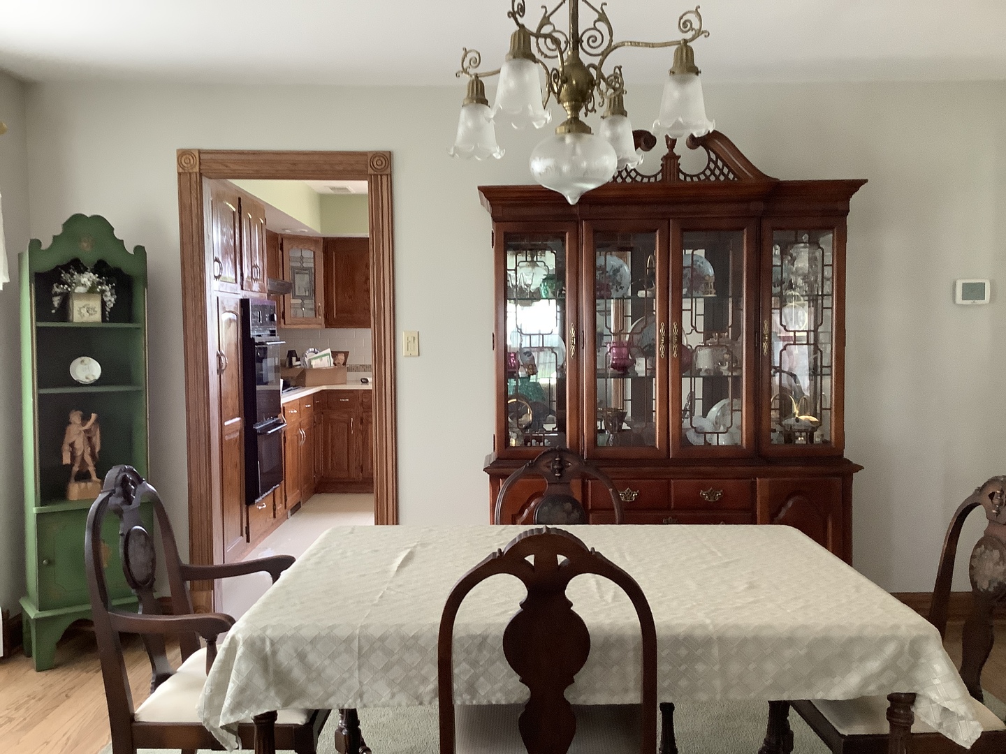 16623 West Sweedler Road Manhattan, IL 60442 - Photo 10 of 43 a view of a dining room with furniture and chandelier