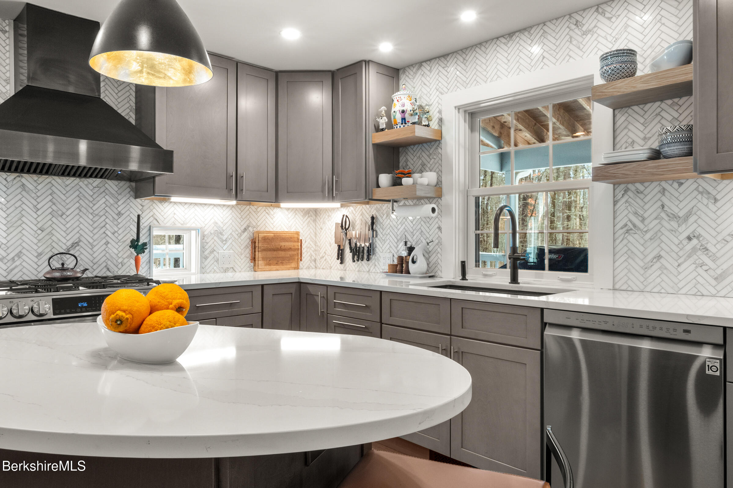 594 Shunpike Road Sheffield, MA 01222 - Photo 17 of 52 a kitchen with stainless steel appliances a sink and a stove