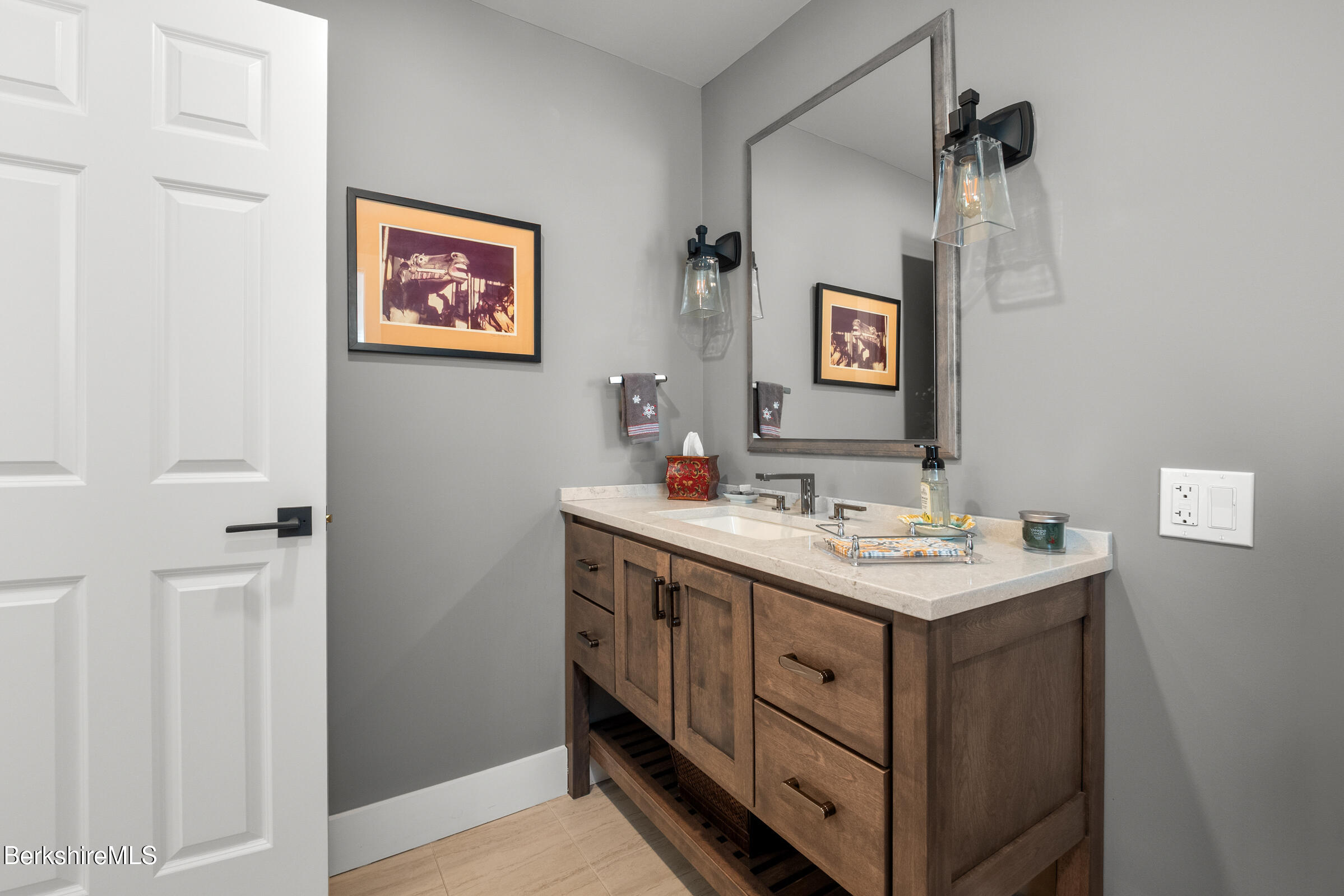 594 Shunpike Road Sheffield, MA 01222 - Photo 23 of 52 a bathroom with a double vanity sink and a mirror