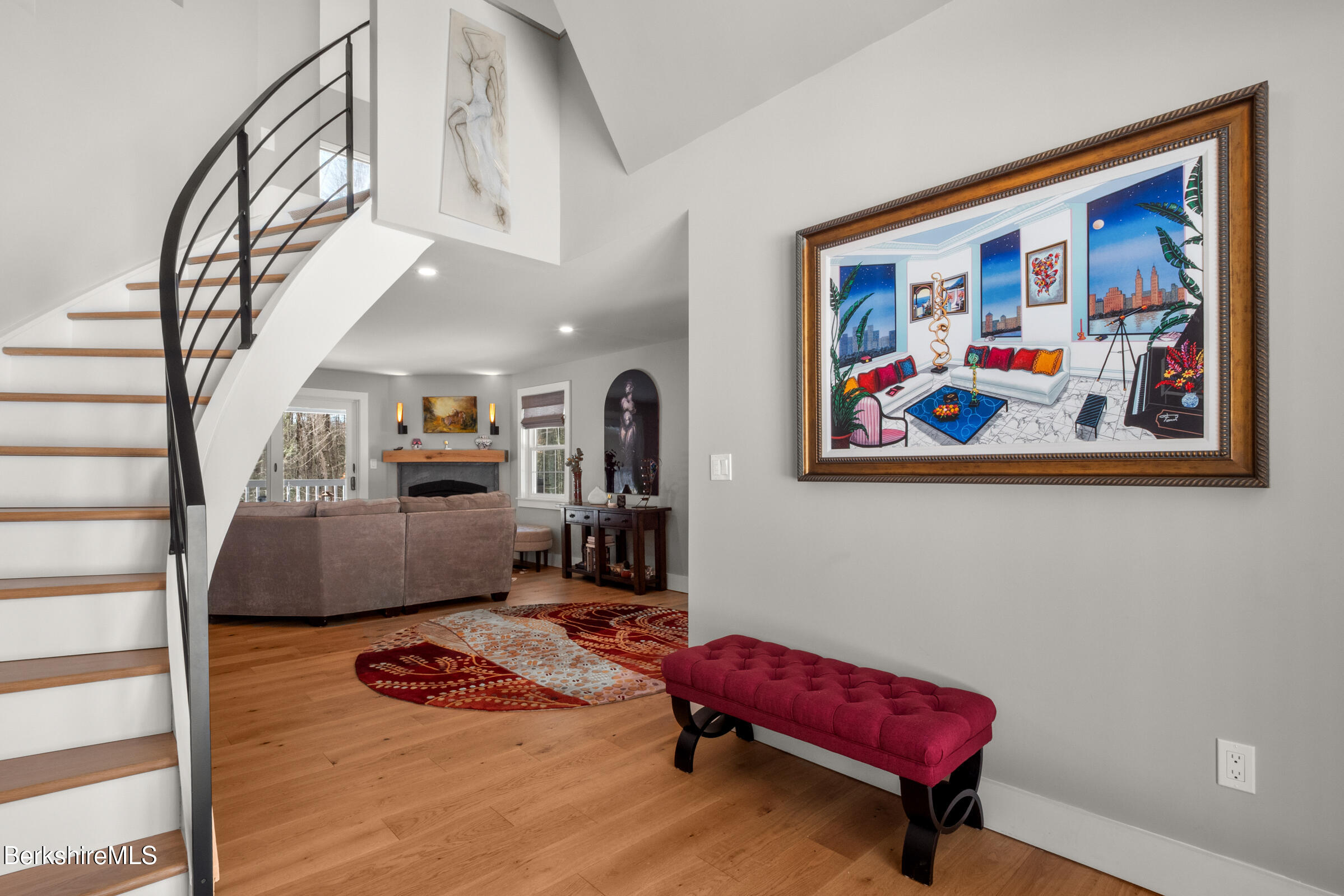 594 Shunpike Road Sheffield, MA 01222 - Photo 26 of 52 a living room with furniture and a painting on the wall