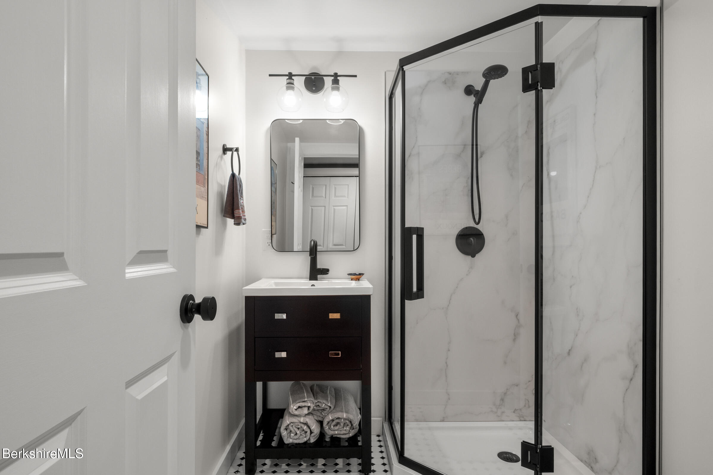 594 Shunpike Road Sheffield, MA 01222 - Photo 30 of 52 a bathroom with a mirror and a shower