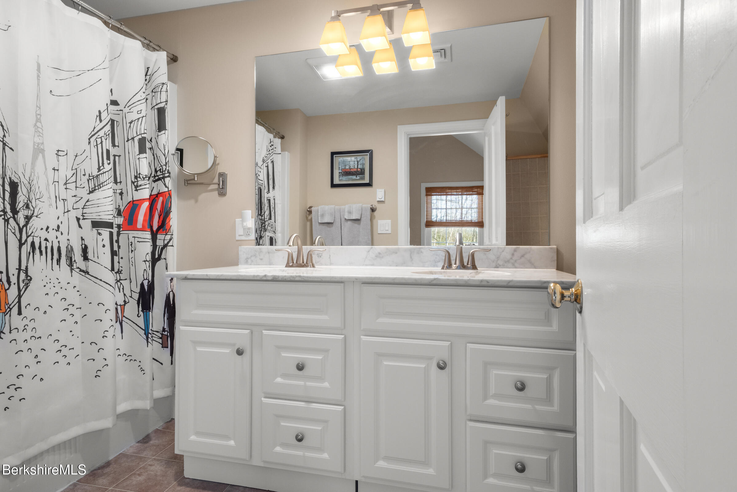 594 Shunpike Road Sheffield, MA 01222 - Photo 33 of 52 a bathroom with a sink vanity and a mirror