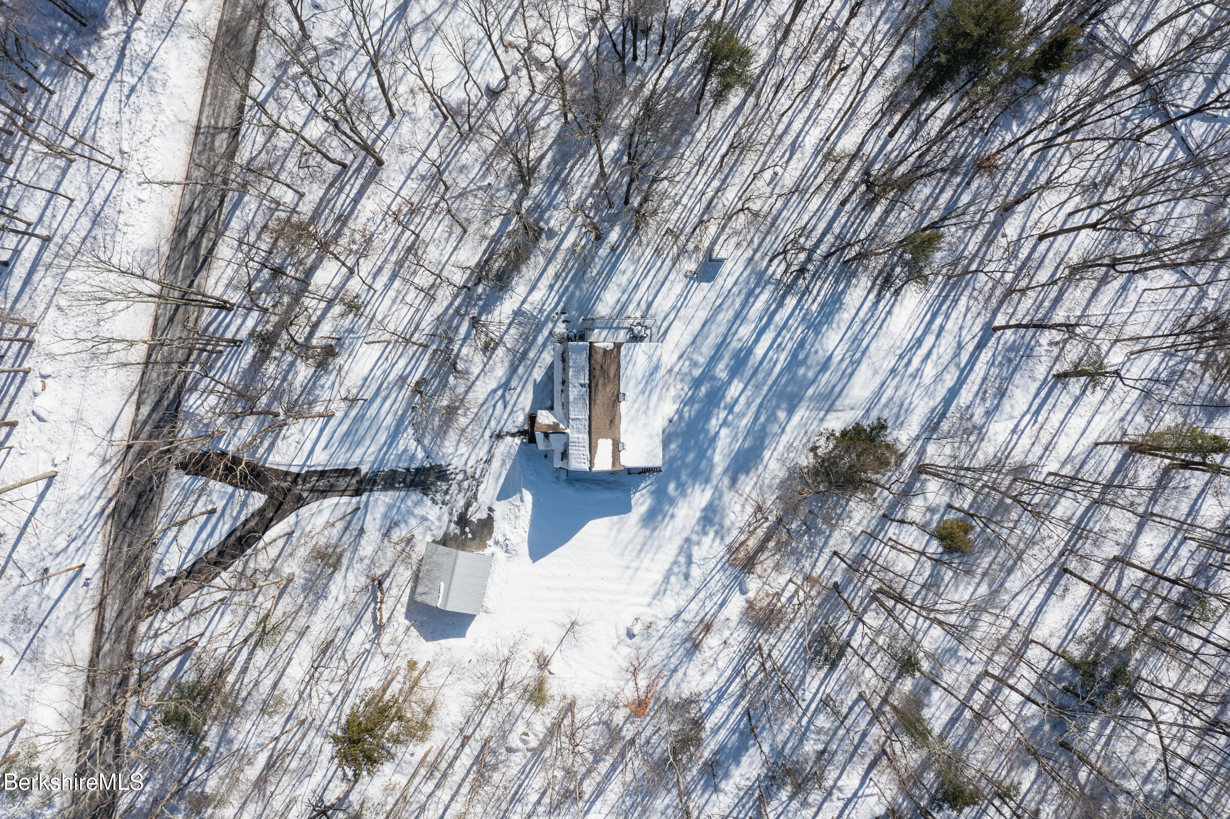 594 Shunpike Road Sheffield, MA 01222 - Photo 37 of 52 a view of snow on the side of a building