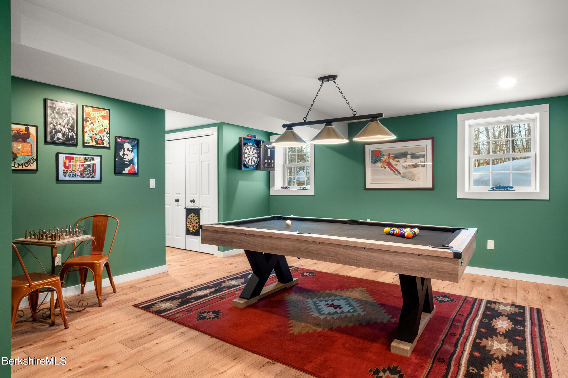 594 Shunpike Road Sheffield, MA 01222 - Photo 38 of 52 a room with furniture and wooden floor