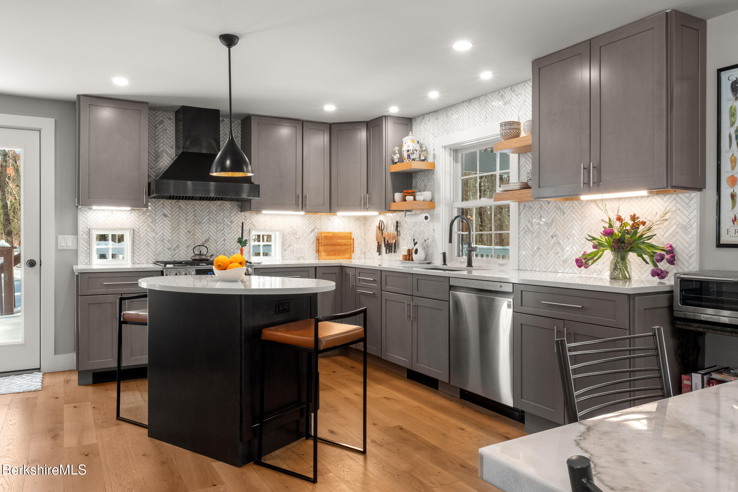 594 Shunpike Road Sheffield, MA 01222 - Photo 4 of 52 a kitchen with stainless steel appliances granite countertop a sink a stove and a wooden floors