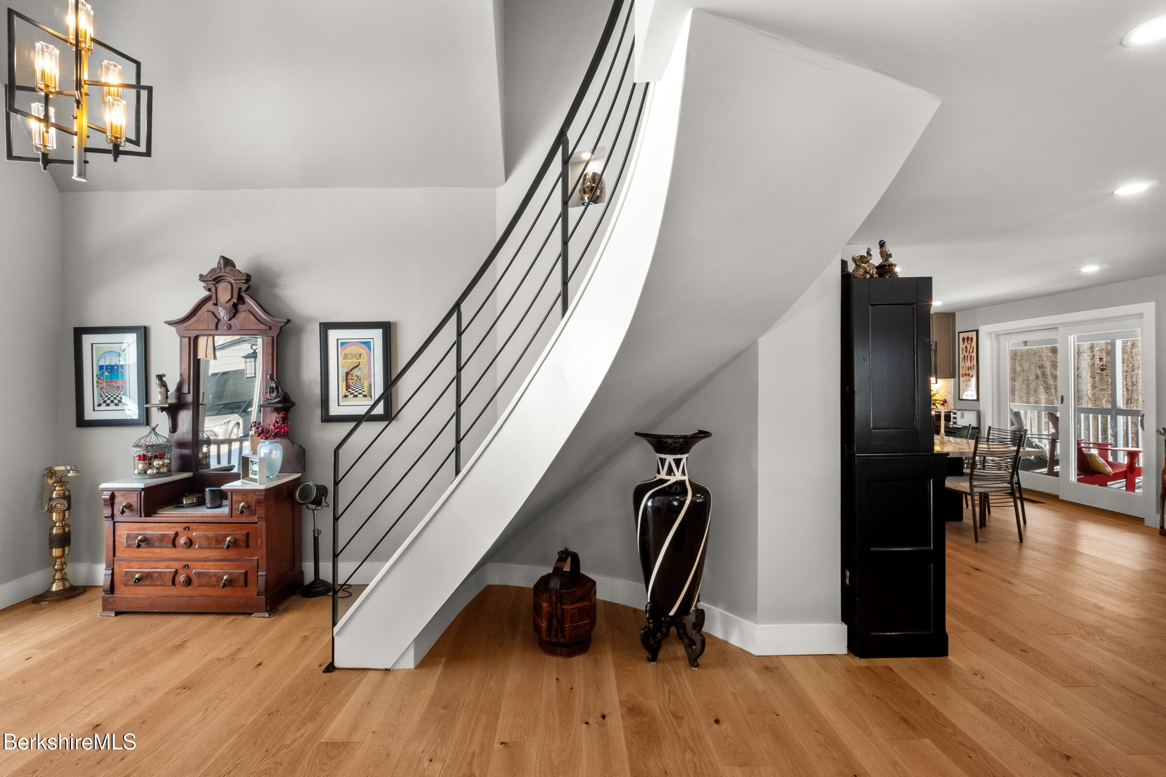 594 Shunpike Road Sheffield, MA 01222 - Photo 42 of 52 a view of a livingroom with furniture and stairs