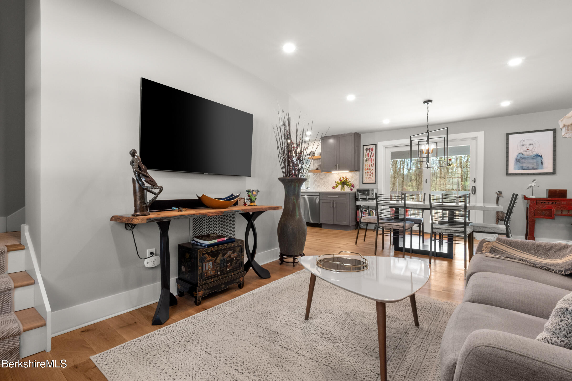 594 Shunpike Road Sheffield, MA 01222 - Photo 47 of 52 a living room with furniture and a flat screen tv