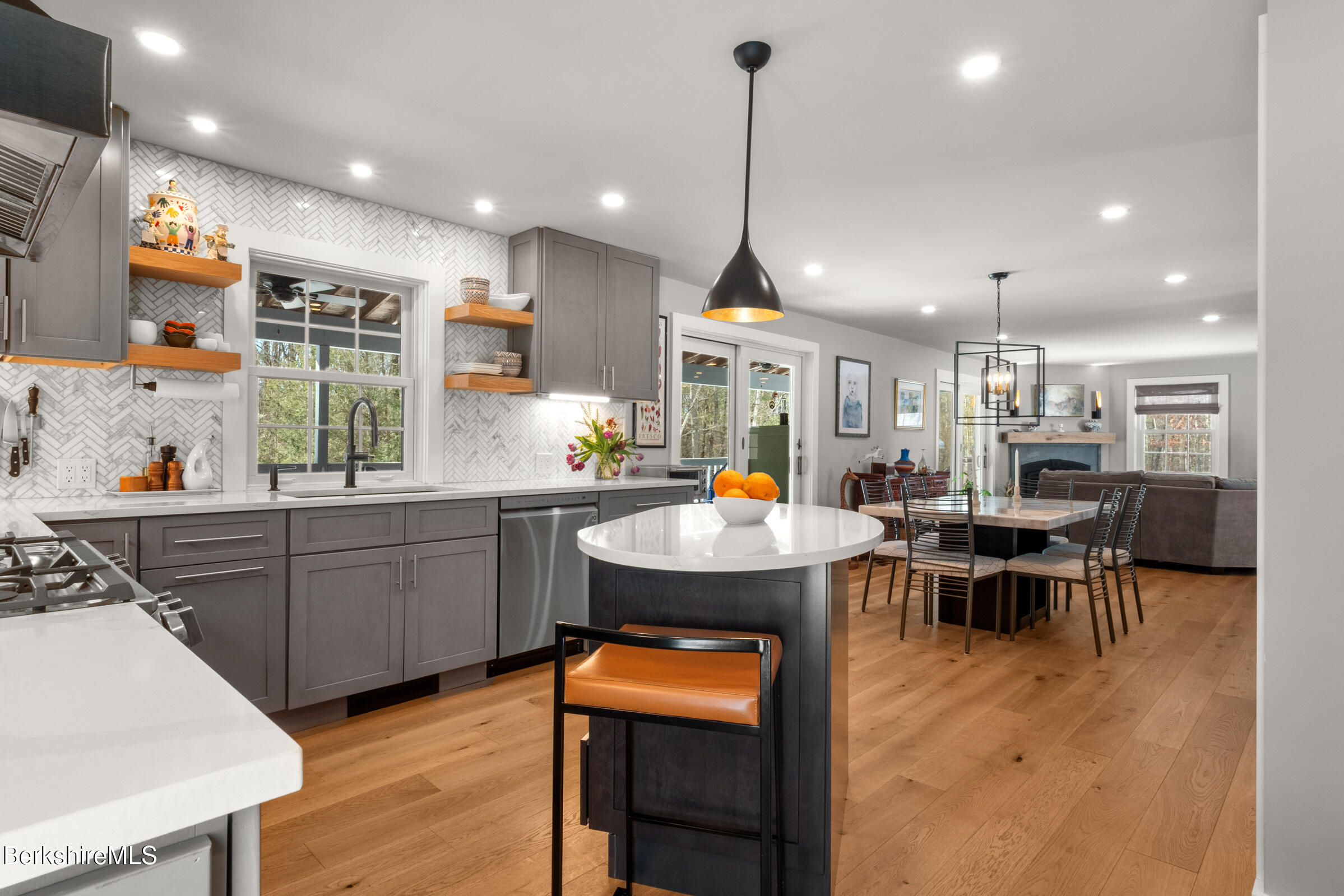 594 Shunpike Road Sheffield, MA 01222 - Photo 48 of 52 a kitchen with counter space appliances and a dining table