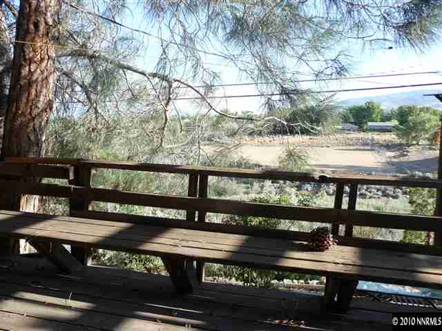3090 Slater Avenue Reno, NV 89503 - Photo 9 of 9 a view of a bench and trees in the background