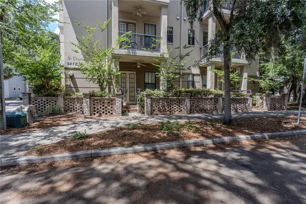 a view of a building with sitting area