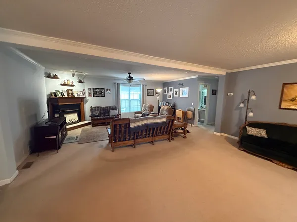 a bedroom with a bed and dresser